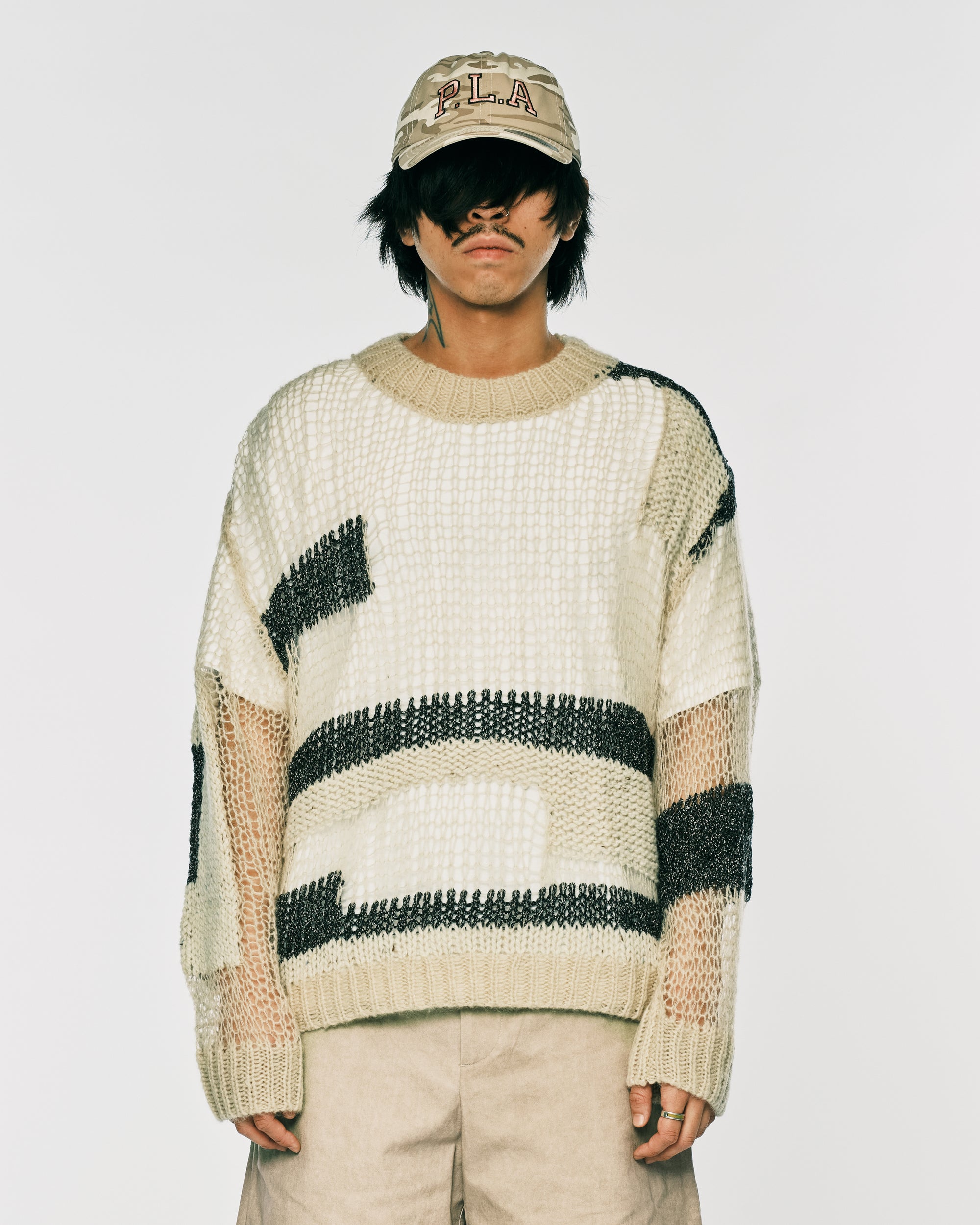 Draft knit sweater