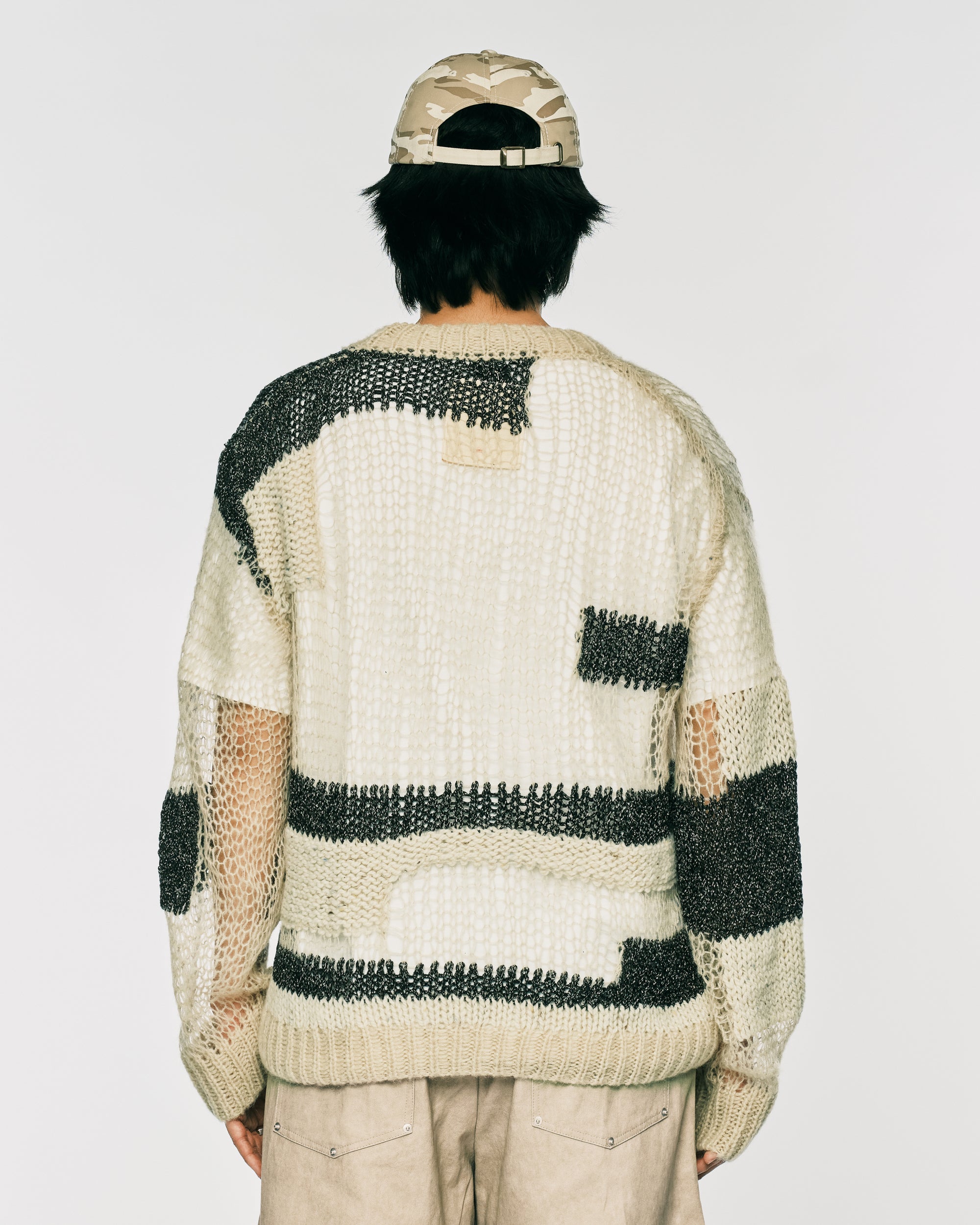 Draft knit sweater