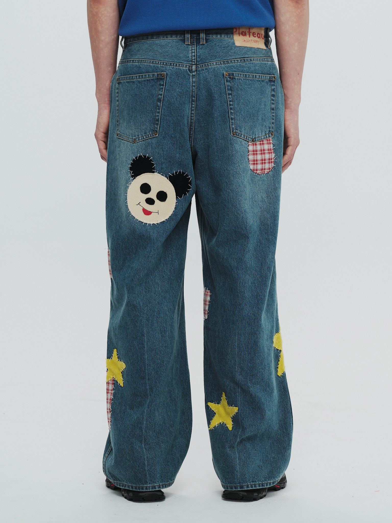 Patch denim pants