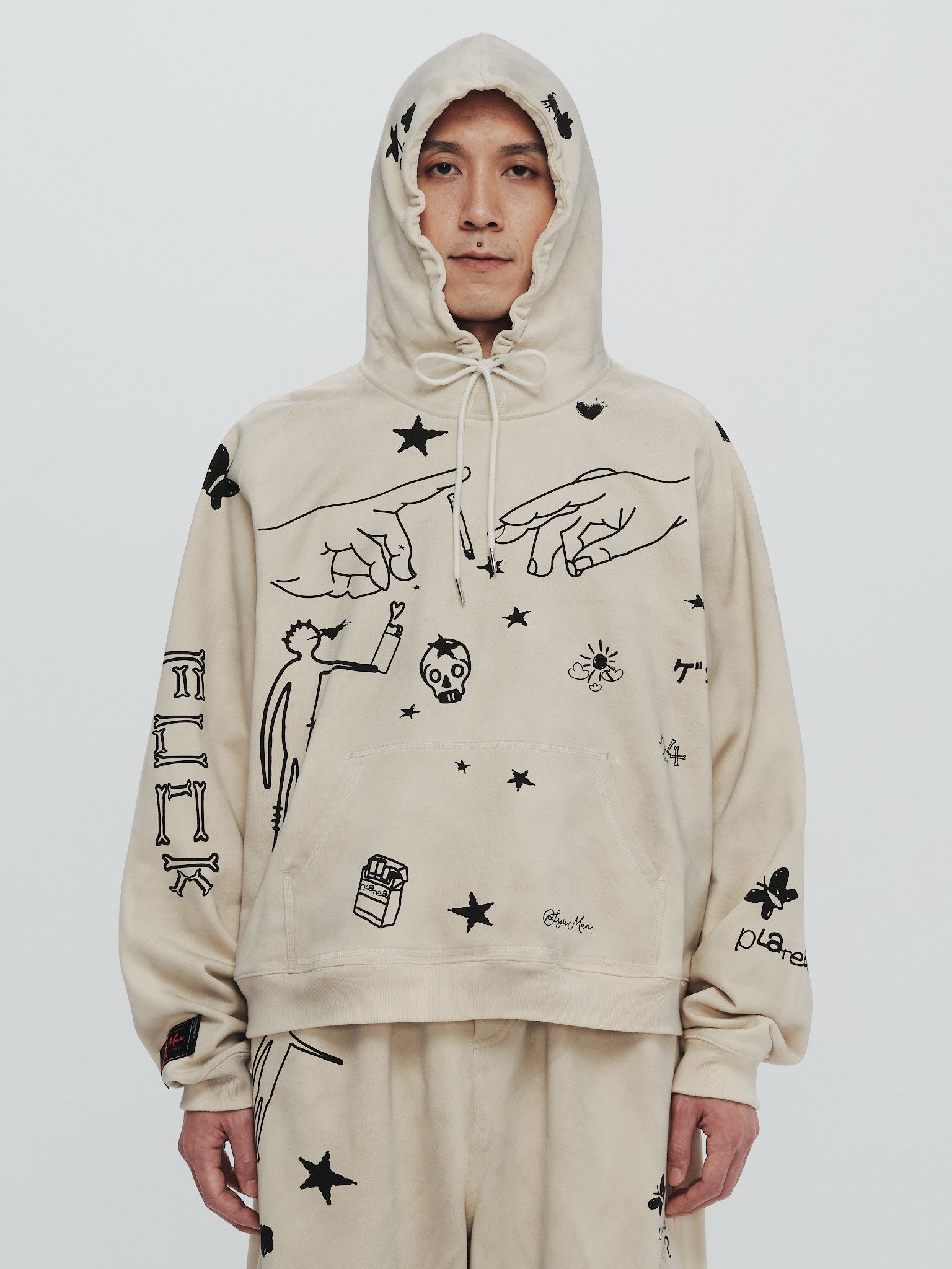 x SYU. Man illustrator hoodie